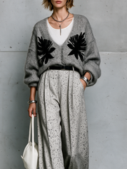Effortless Chic V-Neck Cardigan & Abstract Palazzo Pants Outfit